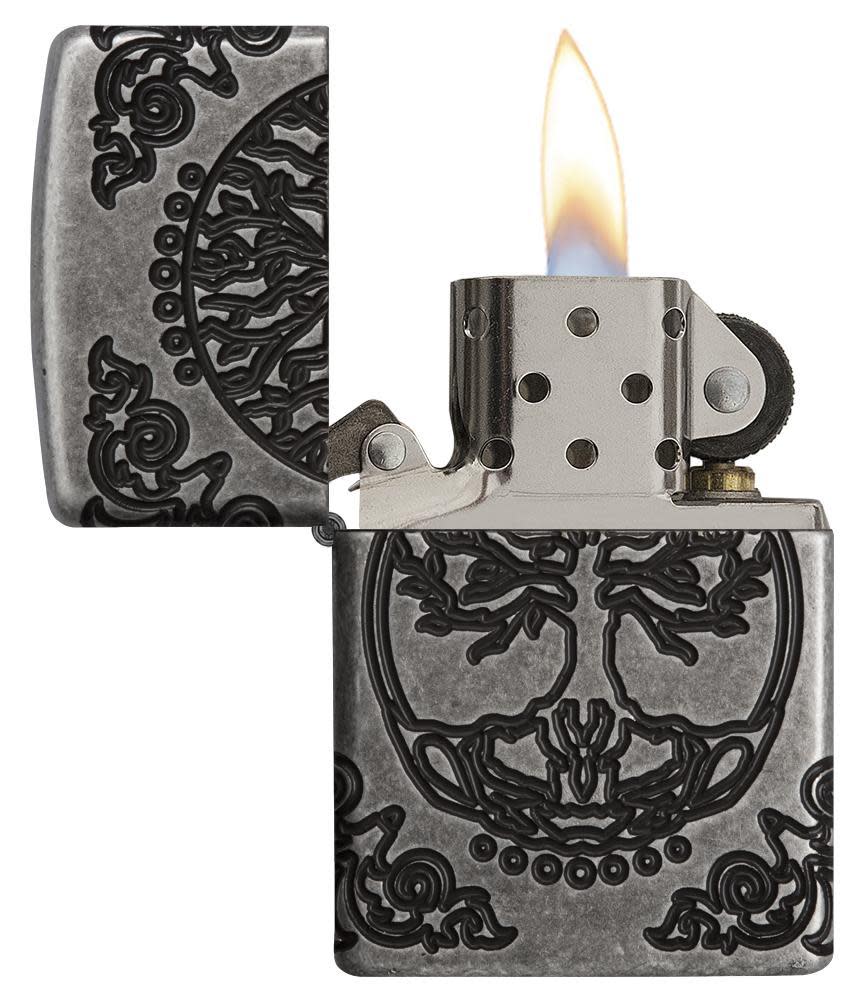 ArmorÂ® Tree of Life Windproof Lighter with its lid open and lit