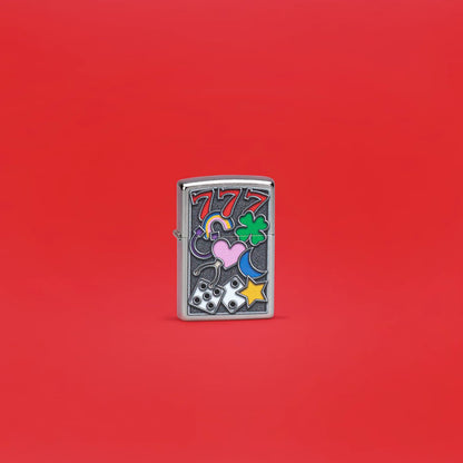 Lifestyle image of Zippo All Luck Design Street Chrome Windproof Lighter standing in a red scene.