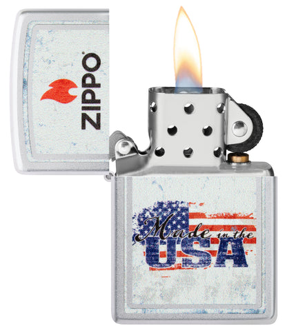Zippo Made in the USA Design Satin Chrome Windproof Lighter with its lid open and lit.