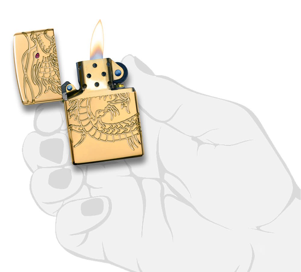 ArmorÂ® Asian Dragon 360-Degree Gold-Plate Windproof Lighter lit in hand