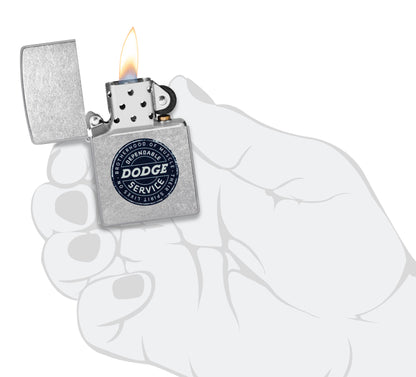 Zippo Dodge Service Sign Street Chrome Windproof Lighter lit in hand.