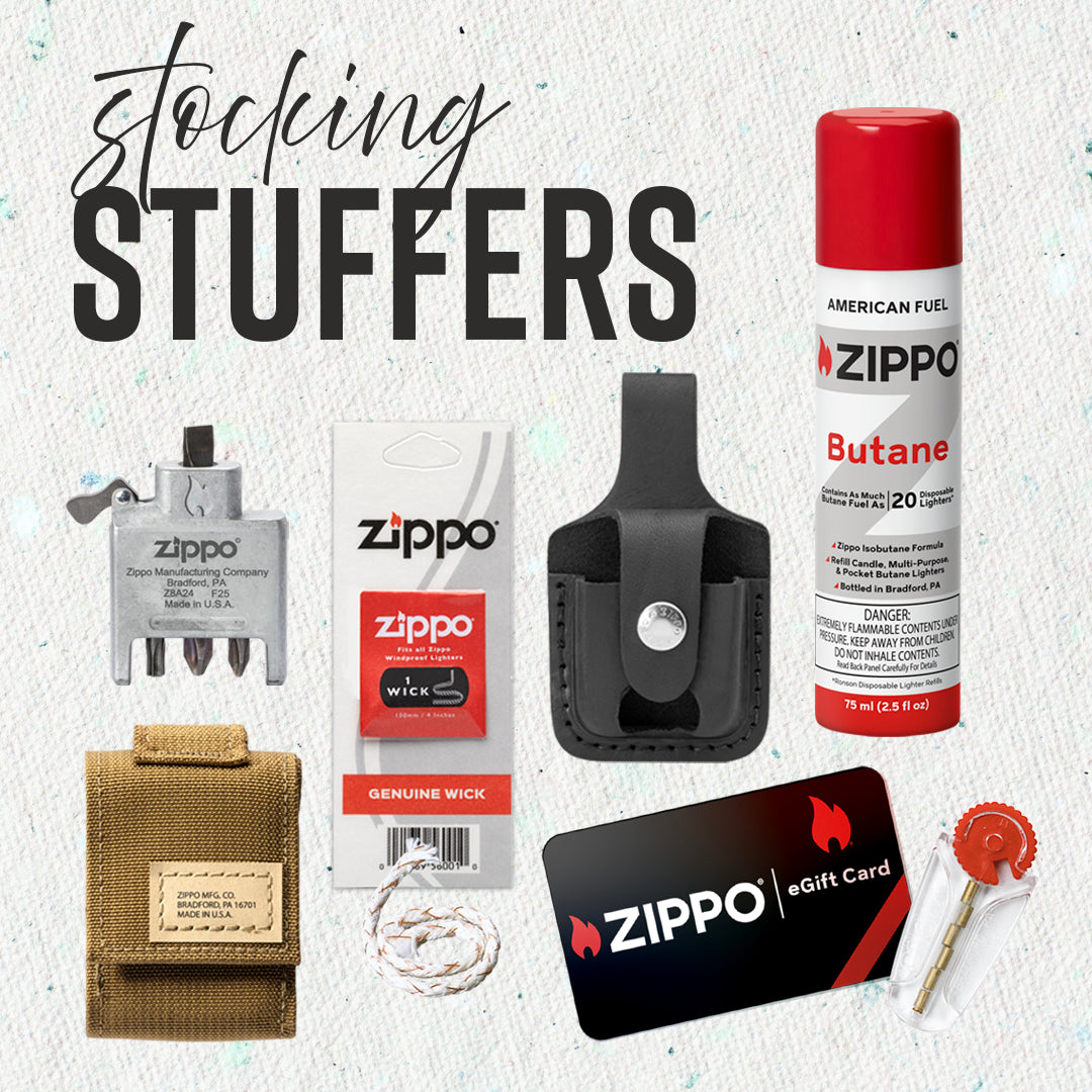 Collection of Zippo products including a lighter, butane can, and e-gift card on a textured background.