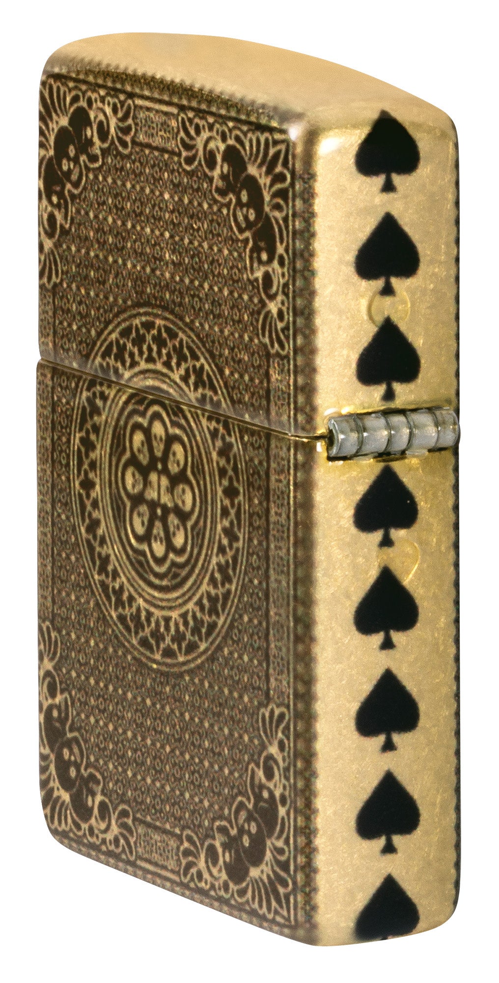 Angled shot of Zippo Ace of Skulls Design 540 Tumbled Brass Windproof Lighter showing the back and hinge side of the lighter.